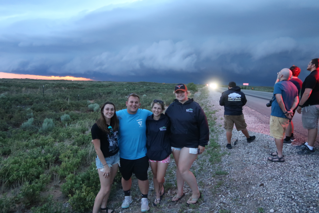 NVU-Lyndon students in front of a shelf cloud in New Mexico. Pictured from left to right: Catie McNeil, Bobby Saba, Camryn Kruger, and Maddie Degroot